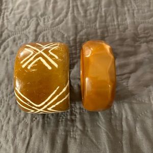 Two plastic bracelets